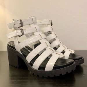 White and black heeled sandals